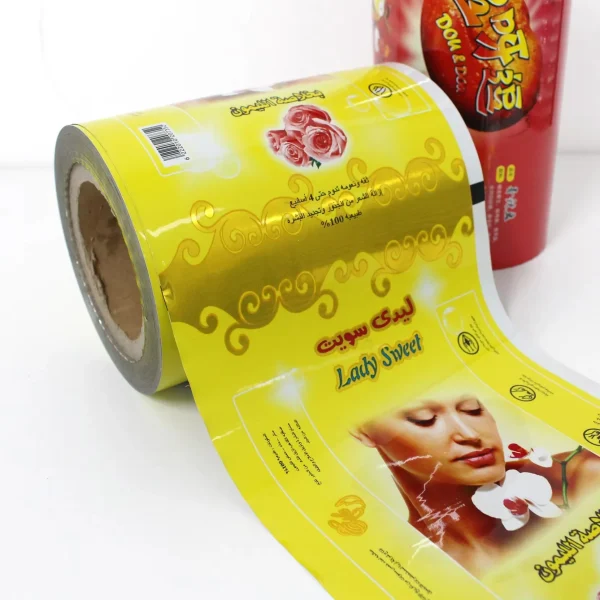 Laminated packaging roll film for biscuits and candy